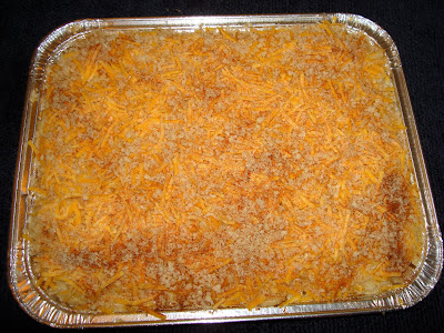 BAKED MACARONI AND CHEESE PORTIONS: 12 INGREDIENTS 20 oz. elbow macaroni 5 tbsp. butter 1 onion, diced 1 minced garlic clove 5 tbsp. flour 5 cups milk 2 cups shredded cheddar cheese 1 cup shredded Monterey Jack cheese 2 tsp. salt ¼ cup Panko bread crumbs. 1 tsp. paprika METHOD In a medium size pot, melt butter at moderate temperature and lightly brown onions and garlic. Stir in flour and cook for about 2 minutes. Add milk and bring to a boil, mixing constantly so the flour does not stick to bottom of the pot. The sauce will thick. Add salt, 1 cup cheddar cheese and Monterey Jack cheese. Mix well. In a deep pot boil water with a bit of salt and cook elbow macaroni al dente. Strain the pasta and in a large bowl mix with the sauce. Reserve 1 cup of sauce. Spray a baking pan with a bit of oil. Place the macaroni mixture in it. Top it with the 1 cup reserved sauce. Spread the cheddar cheese mixture on top. Mix bread crumbs with paprika and sprinkle over the cheese. Bake at 425° F. until top browns a bit. In a medium size pot, melt butter at moderate temperature and lightly brown onions and garlic. Stir in flour and cook for about 2 minutes.    Add milk and bring to a boil, mixing constantly so the flour does not stick to bottom of the pot. The sauce will thick. Add salt, 1 cup cheddar cheese and Monterey Jack cheese. Mix well. In a deep pot boil water with a bit of salt and cook elbow macaroni al dente. Strain the pasta and in a large bowl mix with the sauce. Reserve 1 cup of sauce. Spray a baking pan with a bit of oil. Place the macaroni mixture in it. Top it with the 1 cup reserved sauce. Spread the cheddar cheese mixture on top. Mix bread crumbs with paprika and sprinkle over the cheese. Bake at 425° F. until top browns a bit. The picture shown, is the baked macaroni not baked yet.