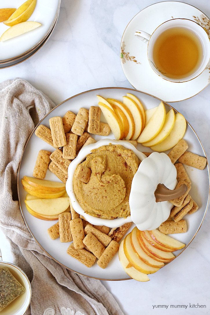 Pumpkin dessert hummus with apples and graham cracker sticks This sweet pumpkin hummus dip tastes just like pumpkin pie and makes a great after school fall snack.
