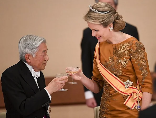 Queen Mathilde diamond tiarra, wore gown, jewellry diamond earrings satin dress gold handbag