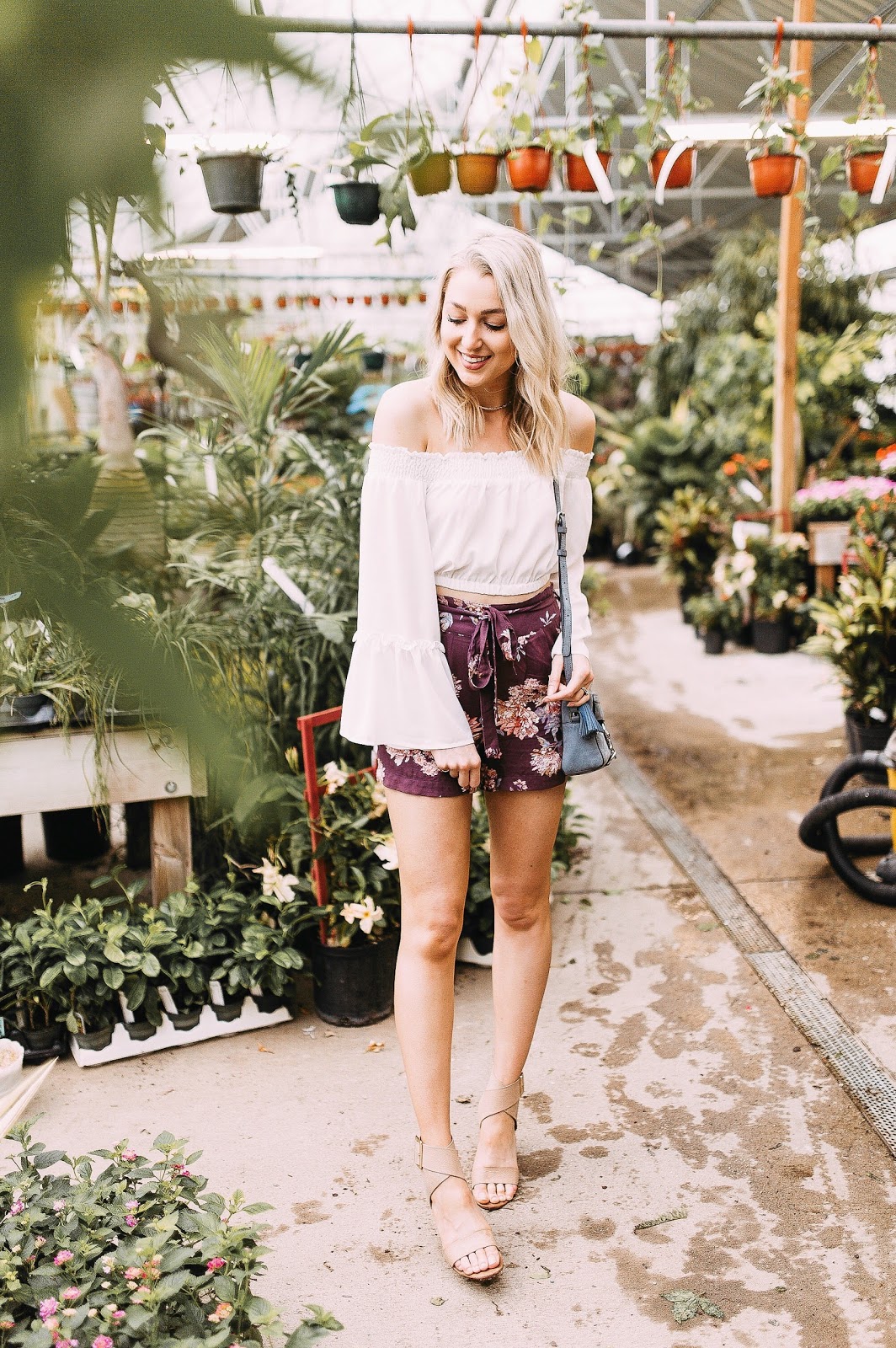 off-the-shoulder top with floral shorts