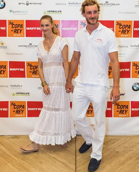 Pierre Casiraghi and Beatrice Borromeo at Palma Royal Nautical Club. Beatrice wore TopShop, Giambatista Valli lace dress