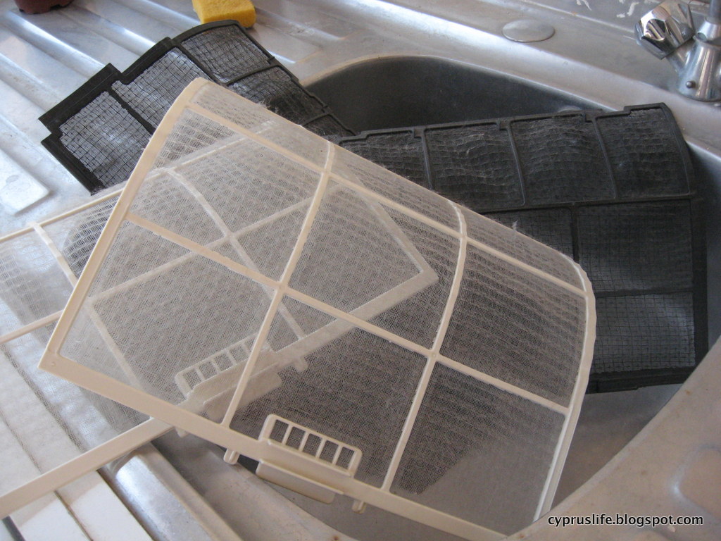 This is Cyprus... Cleaning our air conditioning units (in Cyprus)