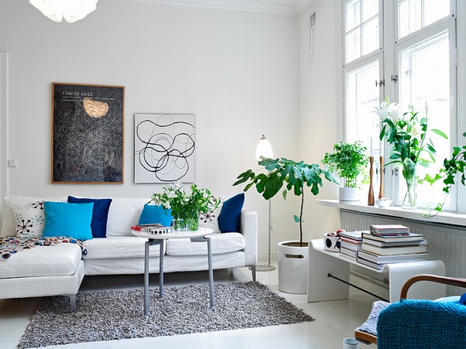 minimalist living room blue white and gray