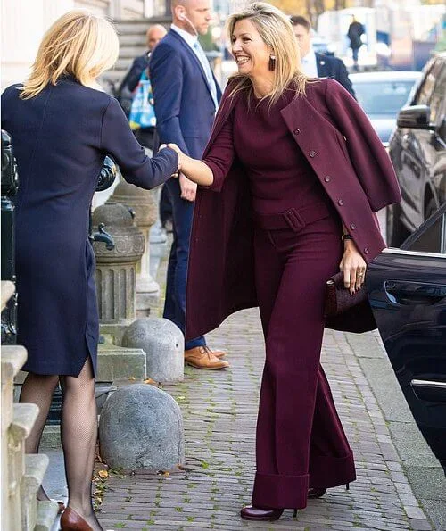 Queen Maxima visited Museum Van Loon, and VU University. The Queen wore a burgundy sweater and pants by Natan