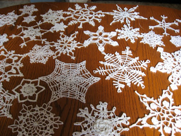 click on this picture and you will find where I get most of my free patterns for these snowflakes.