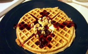 Waffles loaded with bananas and covered with walnuts and a berry maple syrup...yum!  Banana Waffles with Maple Walnut Syrup -Slice of Southern