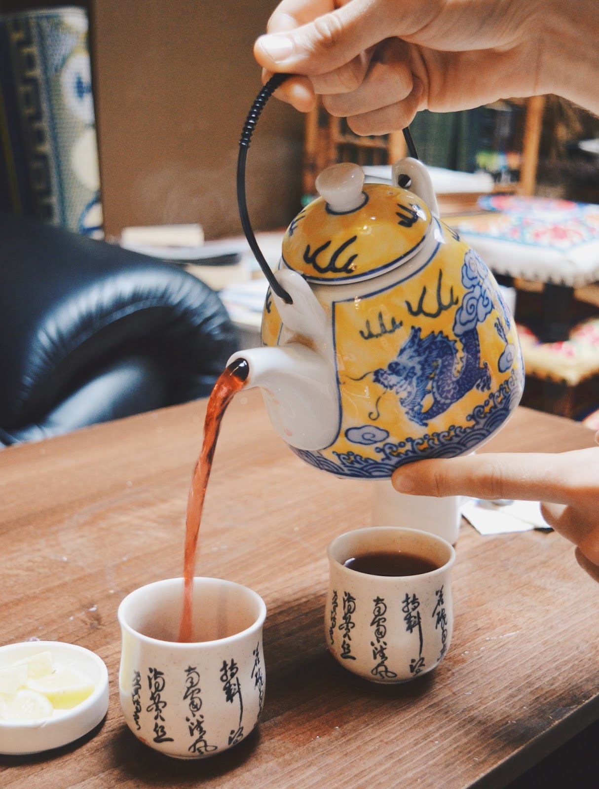 Chinese teapot pouring