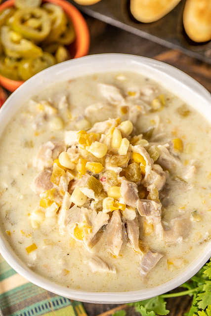 Chicken & Corn Chowder - crazy delicious and ready in 30 minutes! Chicken, onion, garlic, cumin, chicken broth, half-and-half, pepper jack cheese, corn kernels, creamed corn and green chiles. I wanted to lick the bowl! Great for a crowd. Top the chowder with some sour cream, jalapeños and extra cheese. All you need is some cornbread and you are set! The BEST!! #chicken #soup #chickensoup Chicken & Corn Chowder - crazy delicious and ready in 30 minutes! Chicken, onion, garlic, cumin, chicken broth, half-and-half, pepper jack cheese, corn kernels, creamed corn and green chiles. I wanted to lick the bowl! Great for a crowd. Top the chowder with some sour cream, jalapeños and extra cheese. All you need is some cornbread and you are set! The BEST!! #chicken #soup #chickensoup