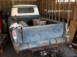 Center section of bumper opens to allow spare tire to slide under the truck bed, out of sight.