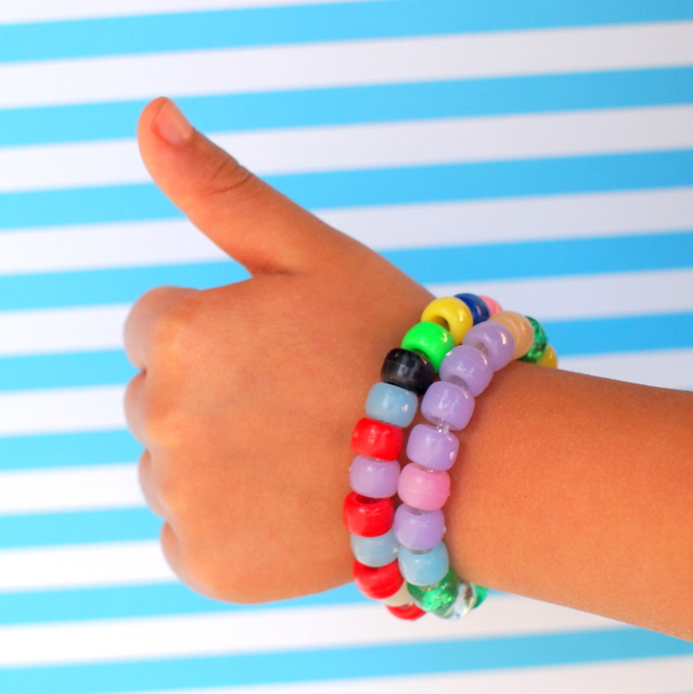 Color Changing Bracelets-  Bracelet looks one way inside... and changes color in the sunlight!  The ULTIMATE spring and summer craft for kiddos!