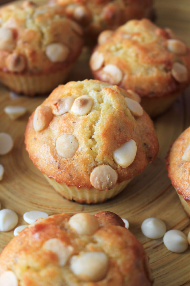 White Chocolate Macadamia Nut Muffins are the perfect grab and go breakfast or snack.  Pair with a glass of iced coffee and some Greek yogurt for a protein-packed treat that will boost your morning mood and re-energize your day! #perfectpickmeup #ad