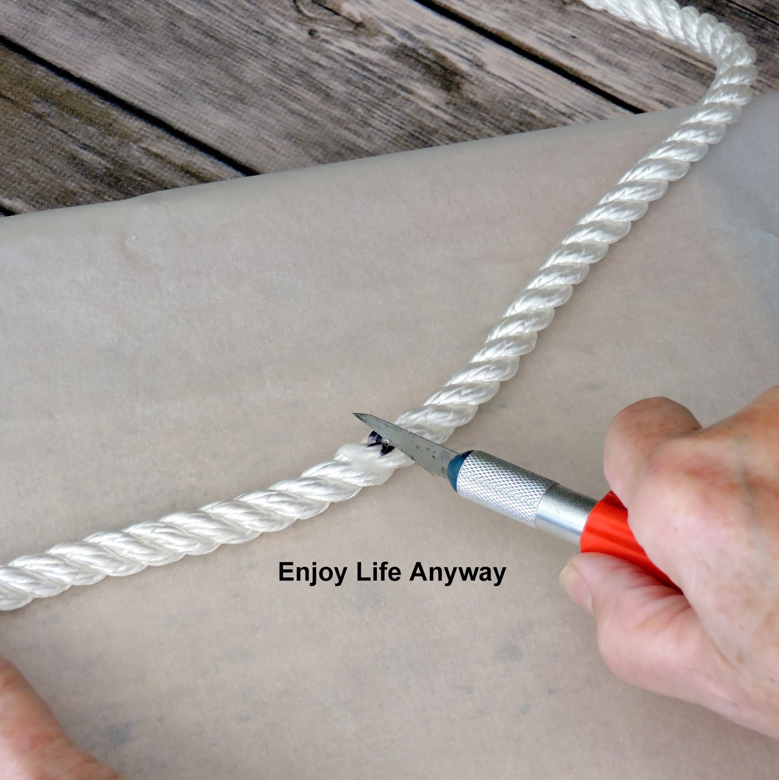 Enjoy Life Anyway DIY Painted Styrofoam Buoy Wreath