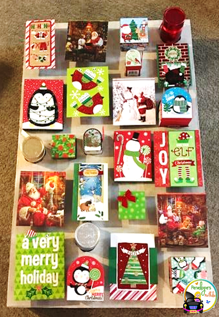 Holiday greeting cards, gift bags, and gift boxes are used to create this life-size advent calendar