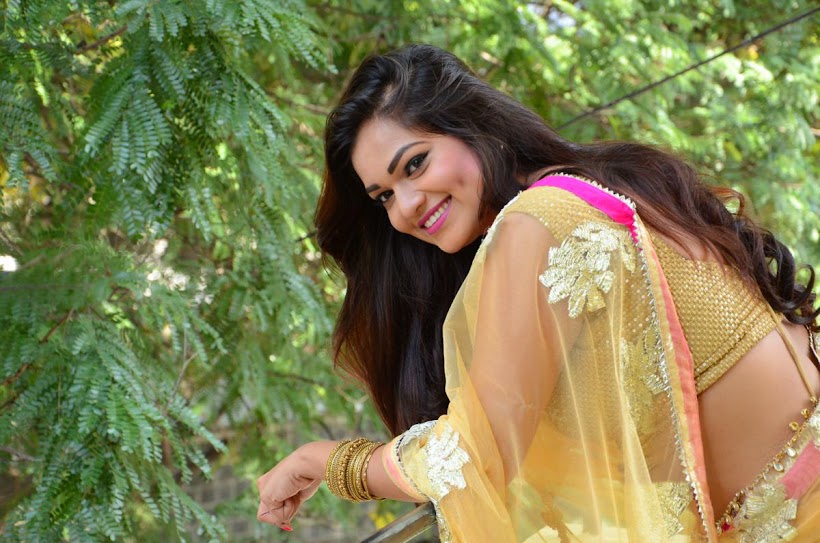 Ashwini Cleavage in Yellow Saree