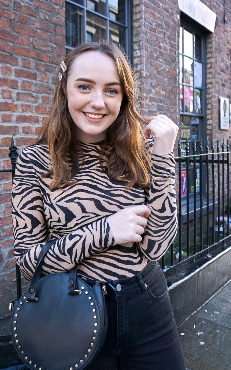 UK fashion blogger wearing glitter zebra print high neck long sleeve top