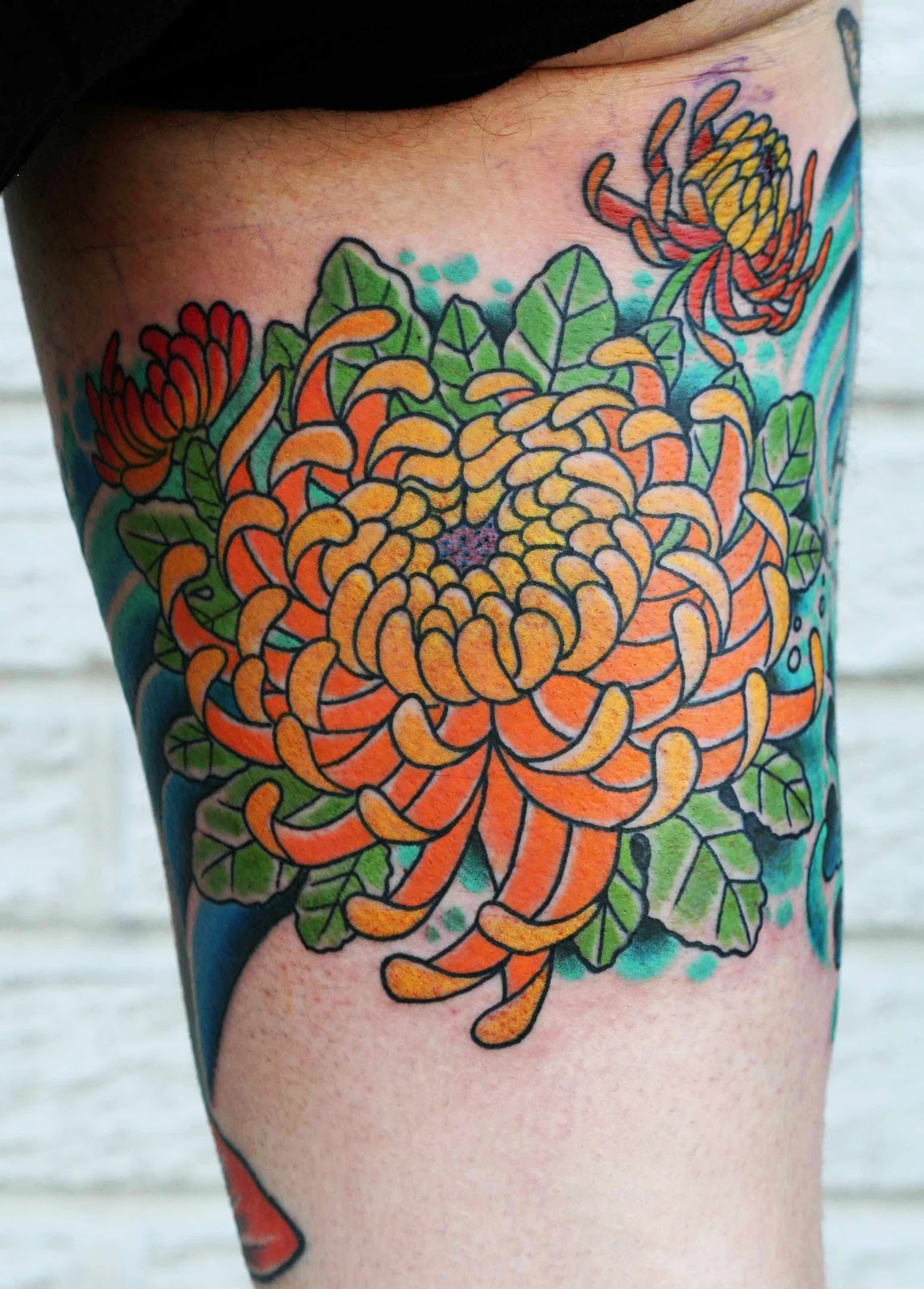 http://4.bp.blogspot.com/-Nq7SrY6FtUo/TvJ8CB1KJBI/AAAAAAAAABU/fw-6ykh4rtE/s1600/Chrysanthemum+Tattoo+Design+And+Symbols+on+arm.jpg