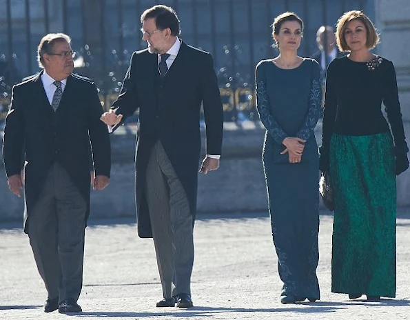 Queen Letizia of Spain attends the New Year's Military Parade at the Palacio Real. Felipe Varela, Magrit pumps, Tous Diamond earrings