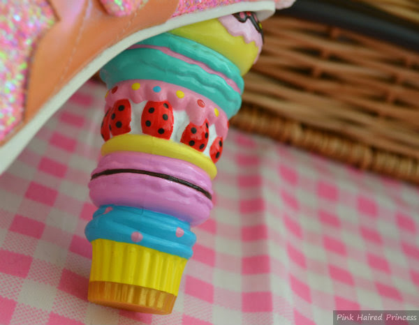 Irregular Choice macaron concept heel macaron cake heel on gingham background