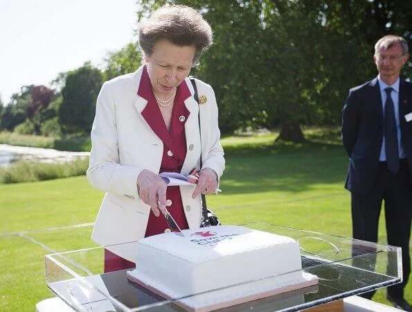 The purpose of Save the Children UK is to protect and support underprivileged children across the world. Burgundy shift dress white jacket