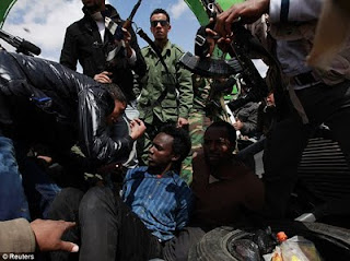 Libyan Rebels Killing Black Africans! 1