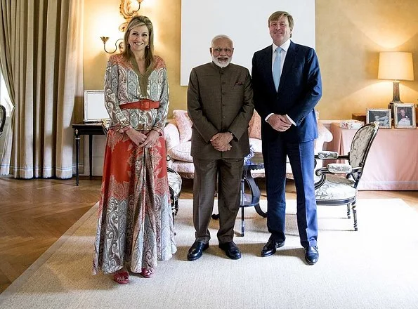 Queen Maxima met with Indian Prime Minister Narendra Modi. Queen Maxima wore Etro multicolor paisley Printed Skirt and Blouse