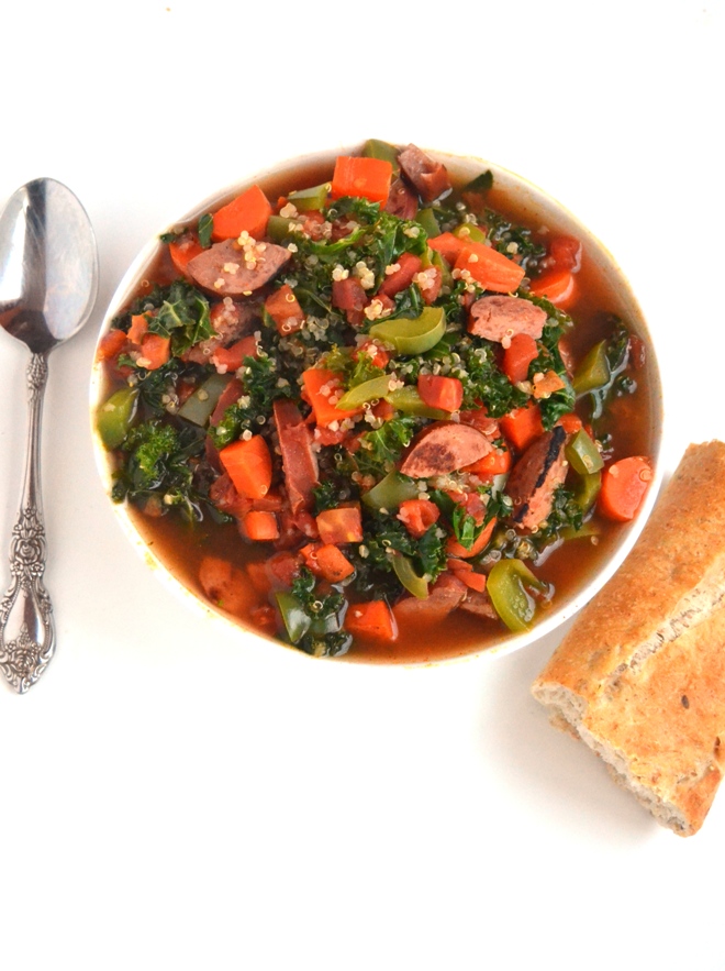 Smoky Sausage, Kale and Quinoa Soup is the perfect hearty, nutritious soup that is full of flavor and spice that your family will love! www.nutritionistreviews.com
