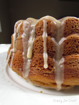 Pumpkin Bundt Cake with Browned Butter Frosting on white linen