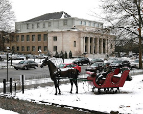 Sleigh in front lawn of Harrison Home.