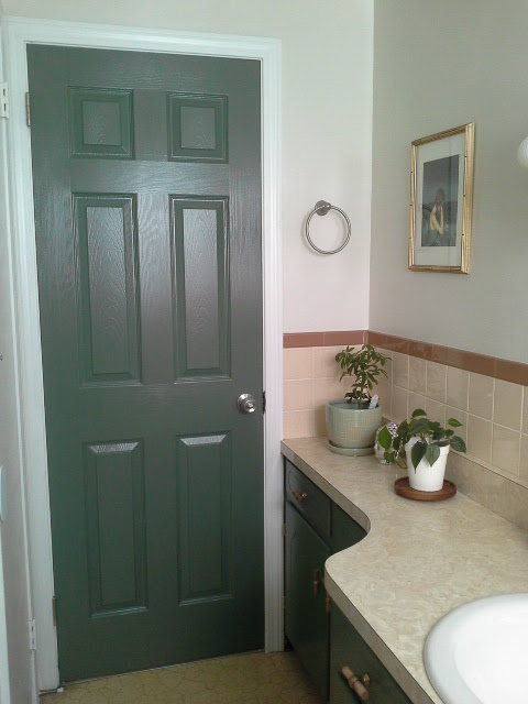 Vintage Bathroom Makeover green cabinets door