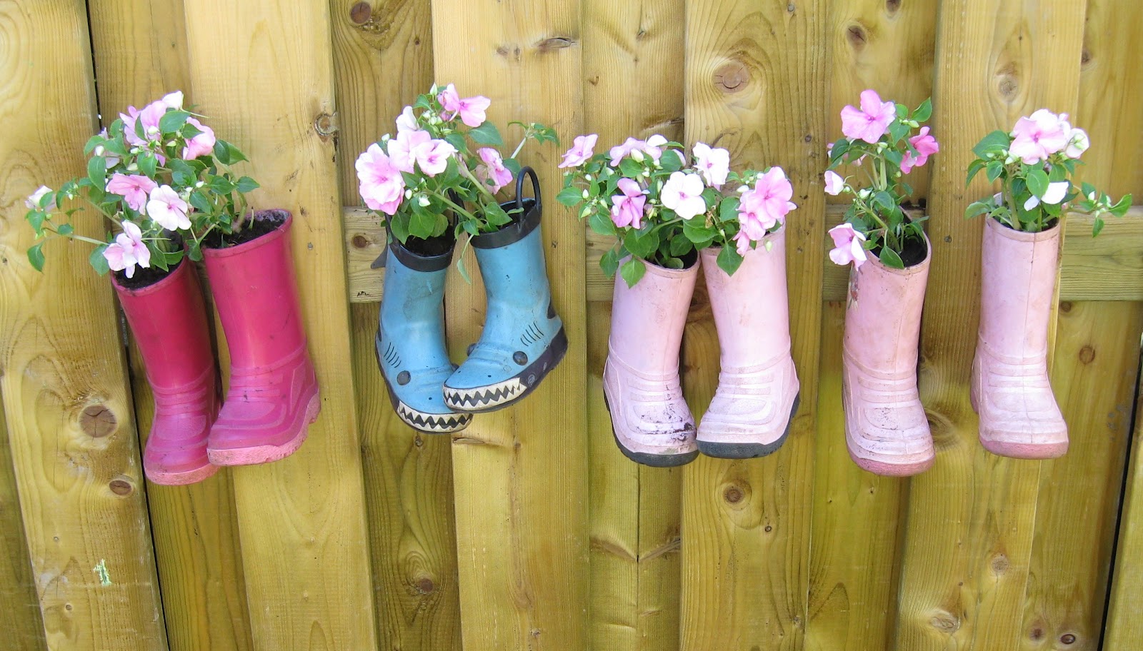 Little Suburban House Rain boot planters