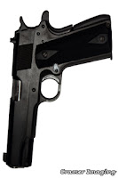 Cramer Imaging's photograph of a 45 caliber pistol gun on a white background