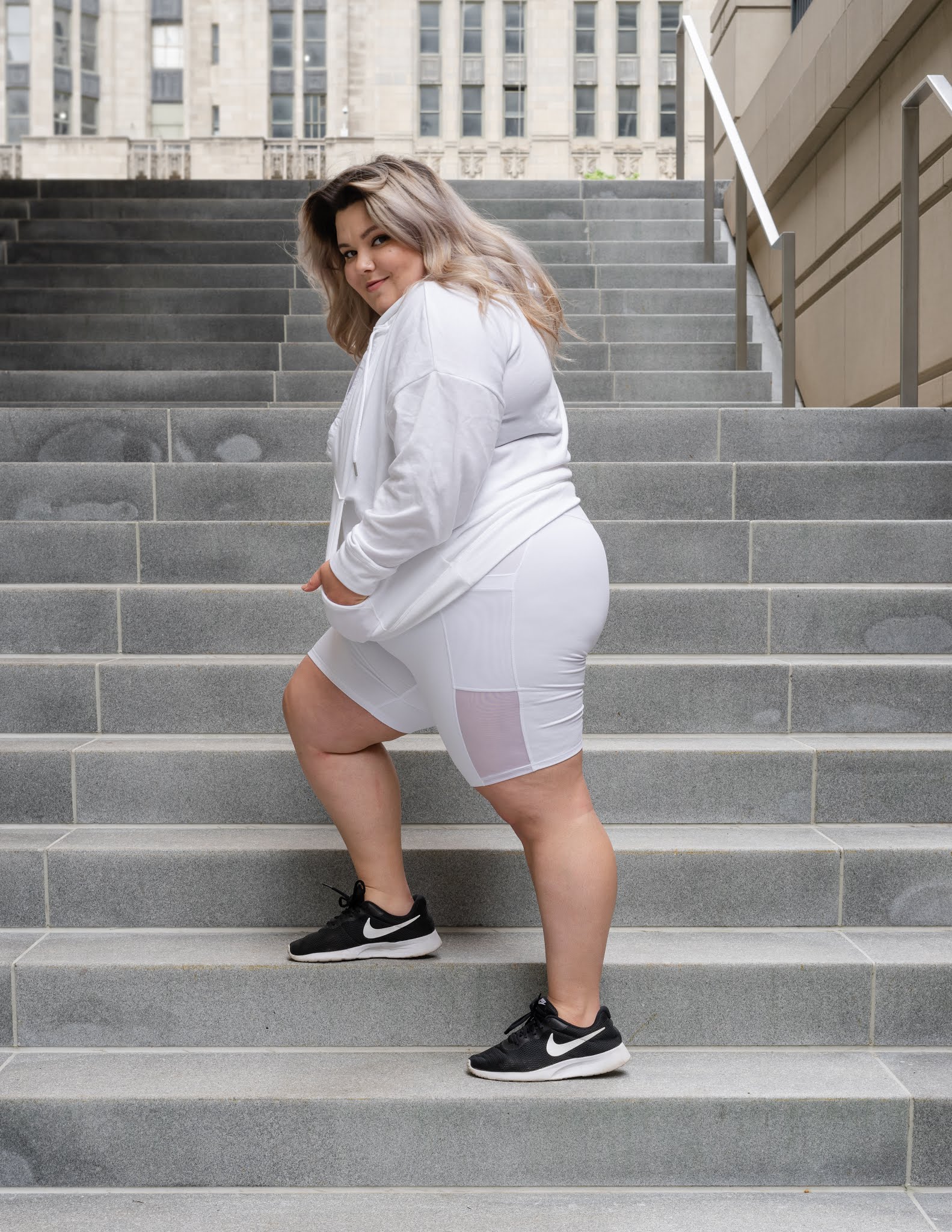 Chicago Plus Size Petite Fashion Blogger and model Natalie Craig Natalie in the City reviews Fabletics biker shorts