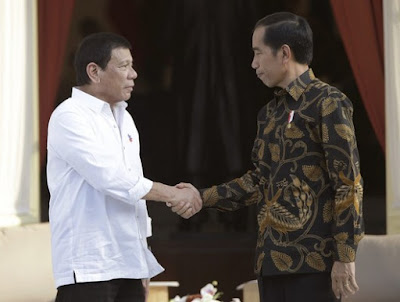 President Duterte, left, and President Widodo, right.