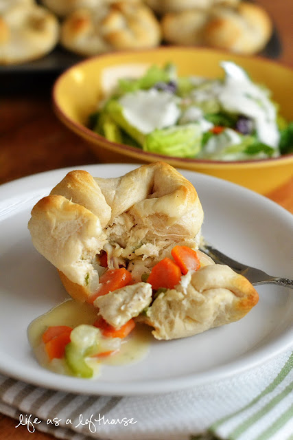 Chicken Pot Pie Biscuits are soft biscuits filled with traditional chicken pot pie ingredients: chicken, carrots, celery and onion. Life-in-the-Lofthouse.com