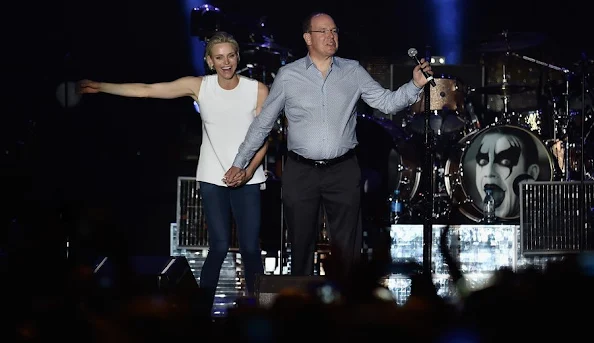 Princess Charlene of Monaco and Prince Albert II of Monaco attend the show of British singer Robbie Williams during celebrations marking Prince Albert II's decade on the throne