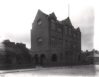 A black and white photo of St. John's National School