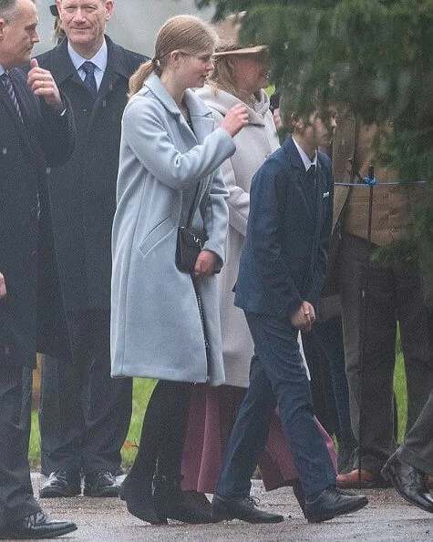 The Queen wore a fur green coat and completed her outfit with a stunning emerald brooch. Countess of Wessex and Princess Charlotte