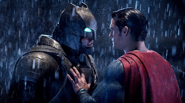 Henry Cavill reprises his role as Clark Kent/Superman to face Batman. batman superman fight face off movie still