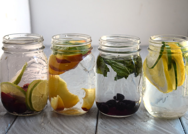 Infused water in 4 different flavors for a super refreshing, no-sugar added drink- lemon cucumber, peach basil, blueberry mint and cherry lime! www.nutritionistreviews.com