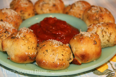 Puffs of tender dough filled with cheese and pepperoni, and served with a side of homemade spicy Rotel marinara sauce, are perfect little bites for entertaining or just for snacking.