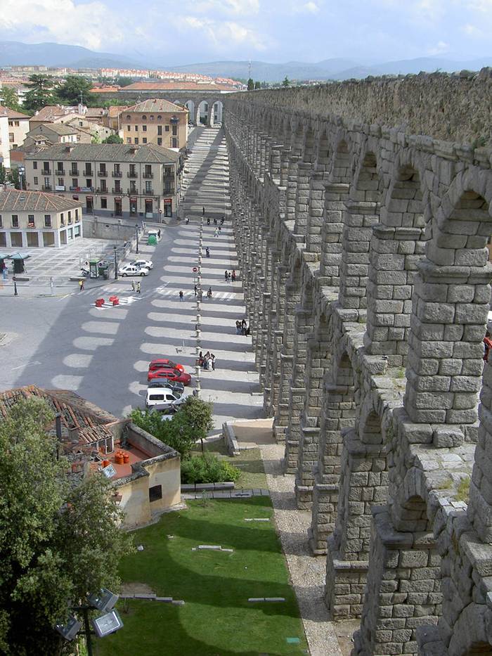The Aqueduct of Segovia is a Roman aqueduct and one of the most significant and best-preserved ancient monuments left on the Iberian Peninsula. It is located in Spain and is the foremost symbol of Segovia, as evidenced by its presence on the city's coat of arms.