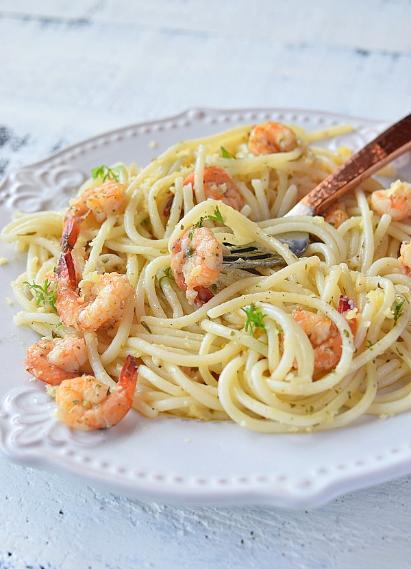 Yummy Shrimp Scampi served with pasta and Parmesan