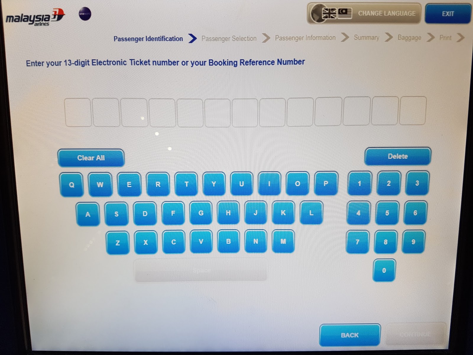 KL Holiday KLIA self check in and self print baggage tag kiosk