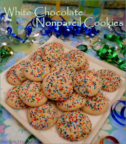 White Chocolate Nonpareil Cookies are perfect for any occasion. White chocolate infused cookie dough, dipped in multicolored nonpareils for a pretty, crunchy topping. | Recipe developed by www.BakingInATornado.com | #recipe #cookies