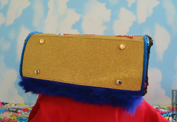 Irregular Choice Muppets Daredevil bag base gold sparkly base of bag with bag on it's side
