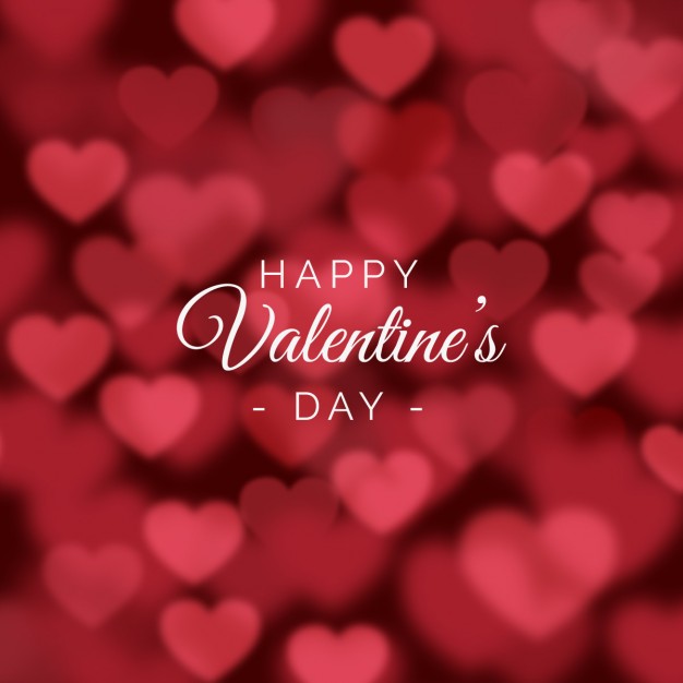 Valentines day background with blurred hearts Free Vector