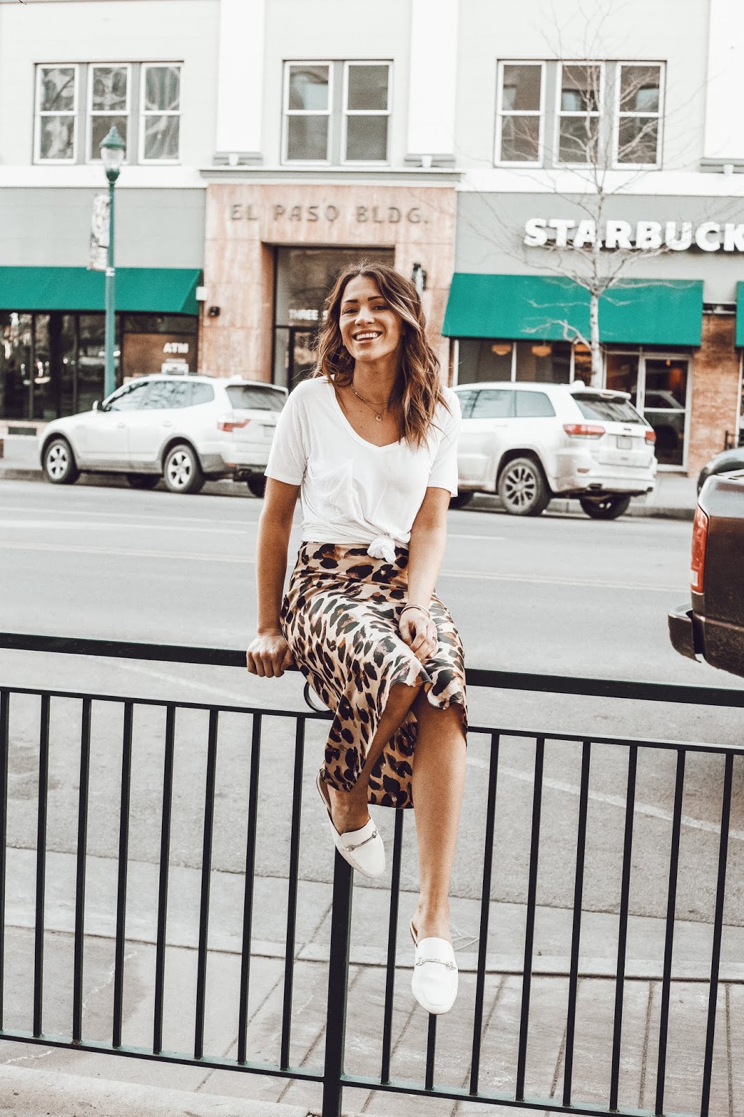 knotted white tee and leopard skirt