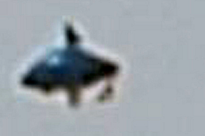 Bizarre 'Rotating' UFO Pictured Over London 4-28-14