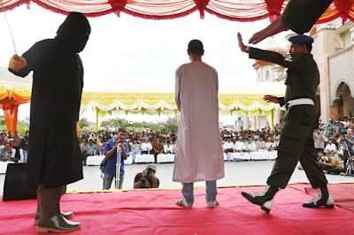 Public whipping in Banda Aceh, Indonesia Public whipping in Banda Aceh, Indonesia