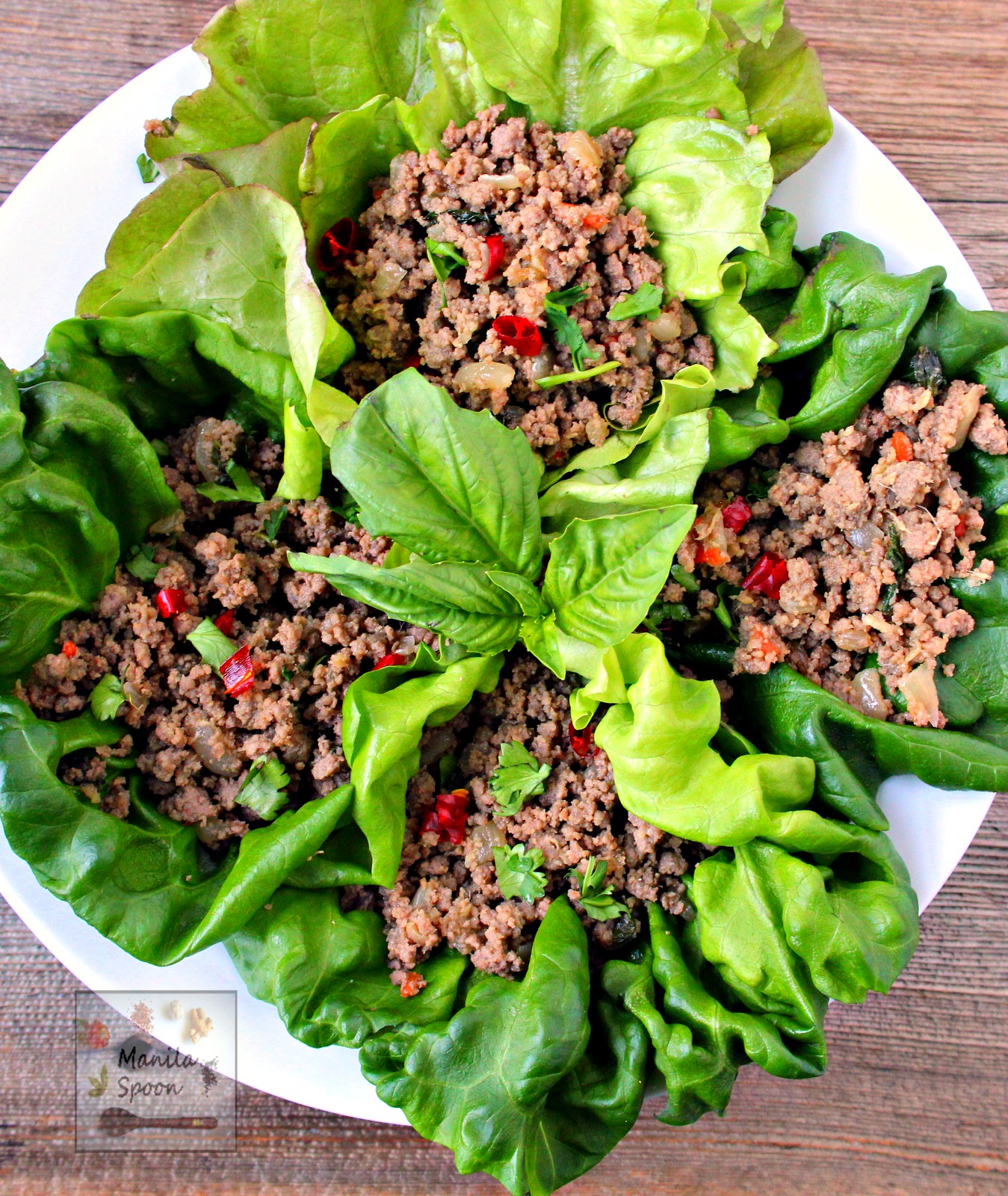 Very tasty, quick and simple to make is this Thai inspired Asian Beef Lettuce Wraps. Perfect as appetizer or as main dish served with Jasmine rice. Gluten-free and paleo-friendly, too. | manilaspoon.com